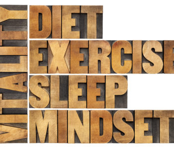diet, sleep, exercise and mindset - vitality concept - isolated word abstract in vintage letterpress wood type